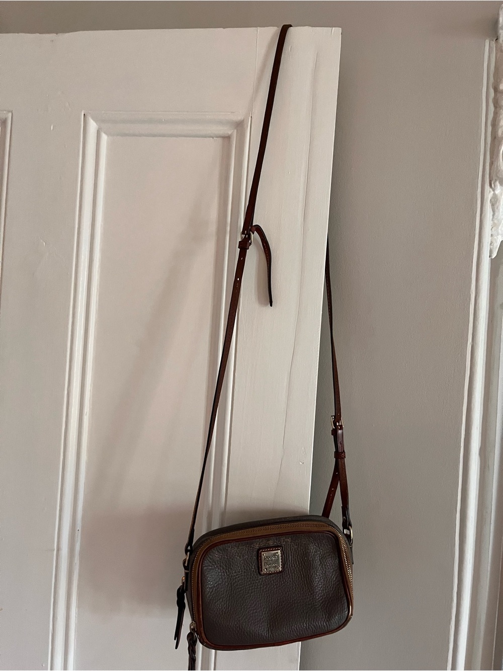 Dooney & Bourke Taupe Pebbled Leather Crossbody with Brass Plaque